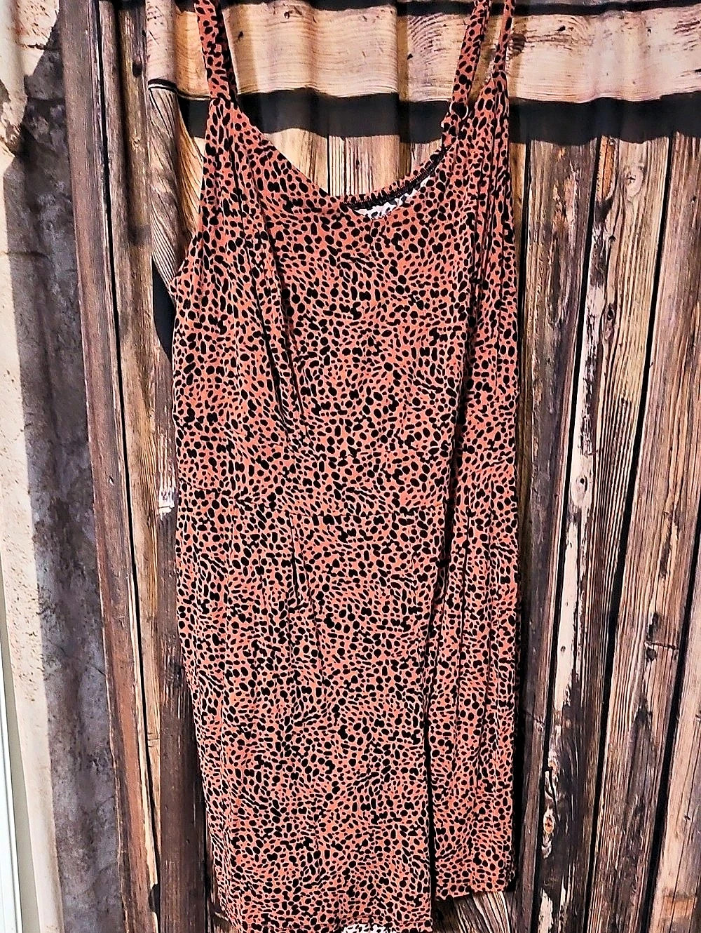 Animal Print Romper
in Orange & Black